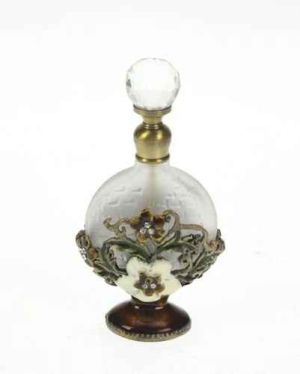 Perfume bottle adorned round cap